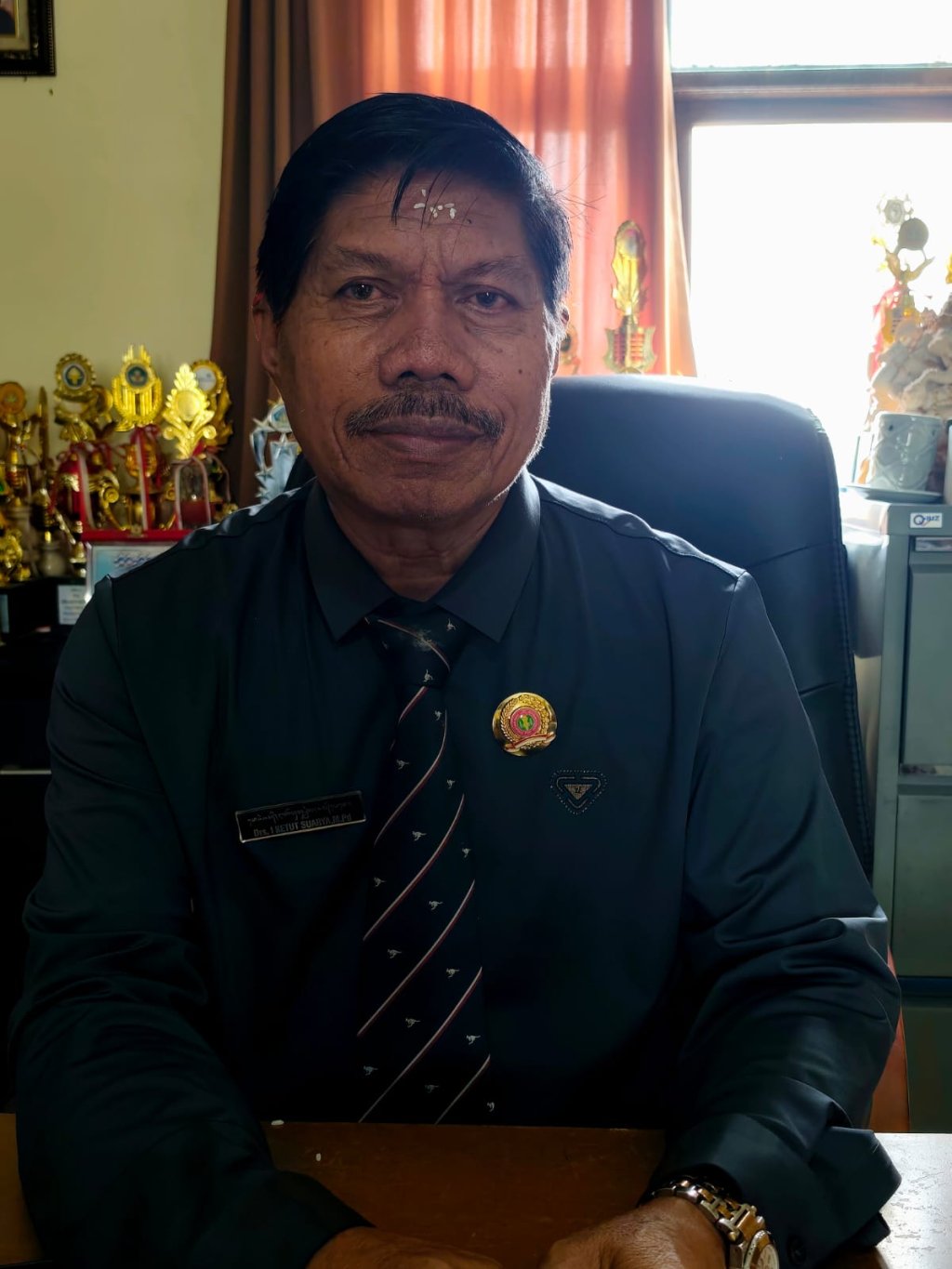 Kepala SMK PGRI 4 Denpasar yang juga menjabat sebagai Ketua PGRI Kota Denpasar, Drs. I Ketut Suarya, M.Pd.,